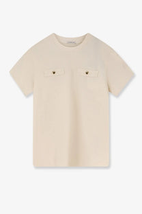 Cream-colored moncler women’s short-sleeved cotton shirt with two front pockets fastened by gold-tone buttons