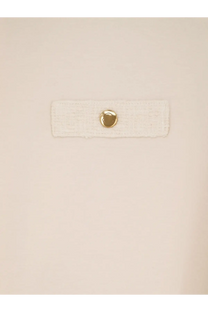 A cream-colored textured fabric strap with a gold-toned button on the back of moncler women’s white cotton shirt