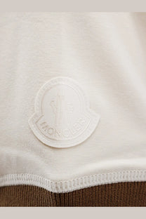 Moncler women’s cotton shirt white with cream color and white Moncler logo patch on the front