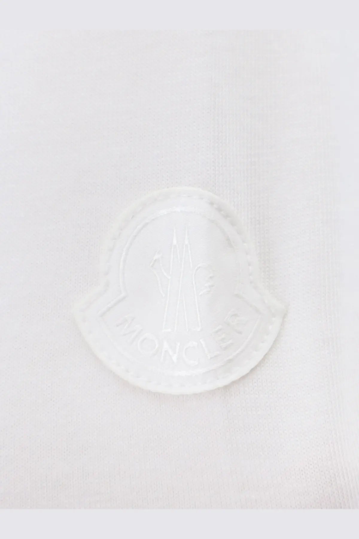 Moncler women’s white cotton shirt with white moncler logo patch embroidered on light fabric front side