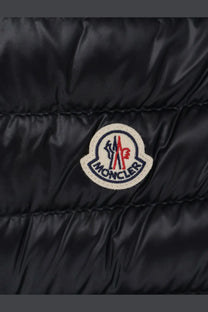 Black sleeveless down jacket with white embroidered Moncler logo patch on front panel for women Glygosse model