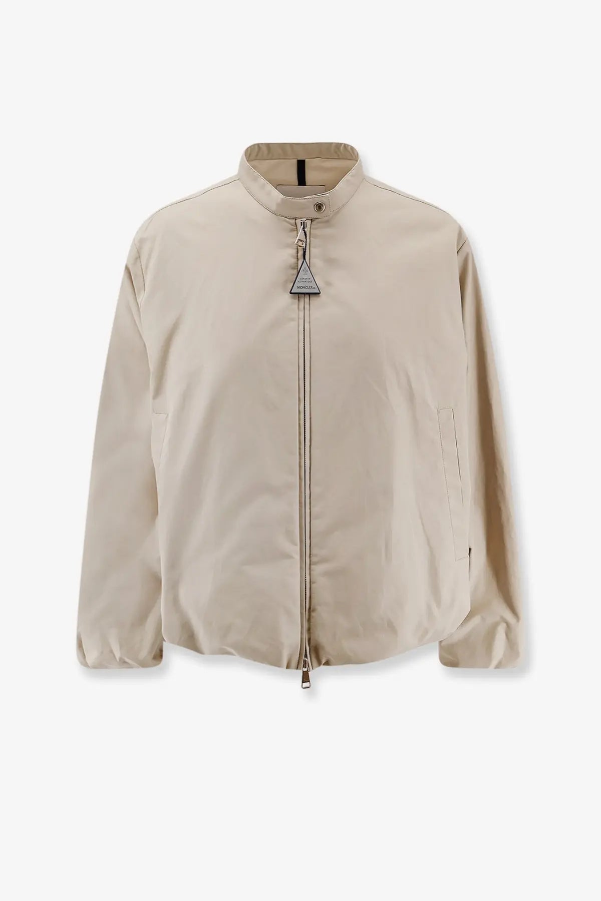 Beige Moncler women’s Gruissan bomber jacket with stand-up collar and front zipper closure with triangular metal pull tab