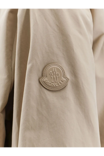 Beige moncler logo patch on the front of a light-colored moncler women’s gruissan jacket