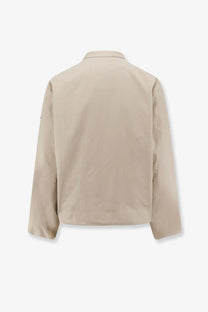 Moncler women’s Gruissan beige utility jacket with classic collar and long sleeves made of durable fabric