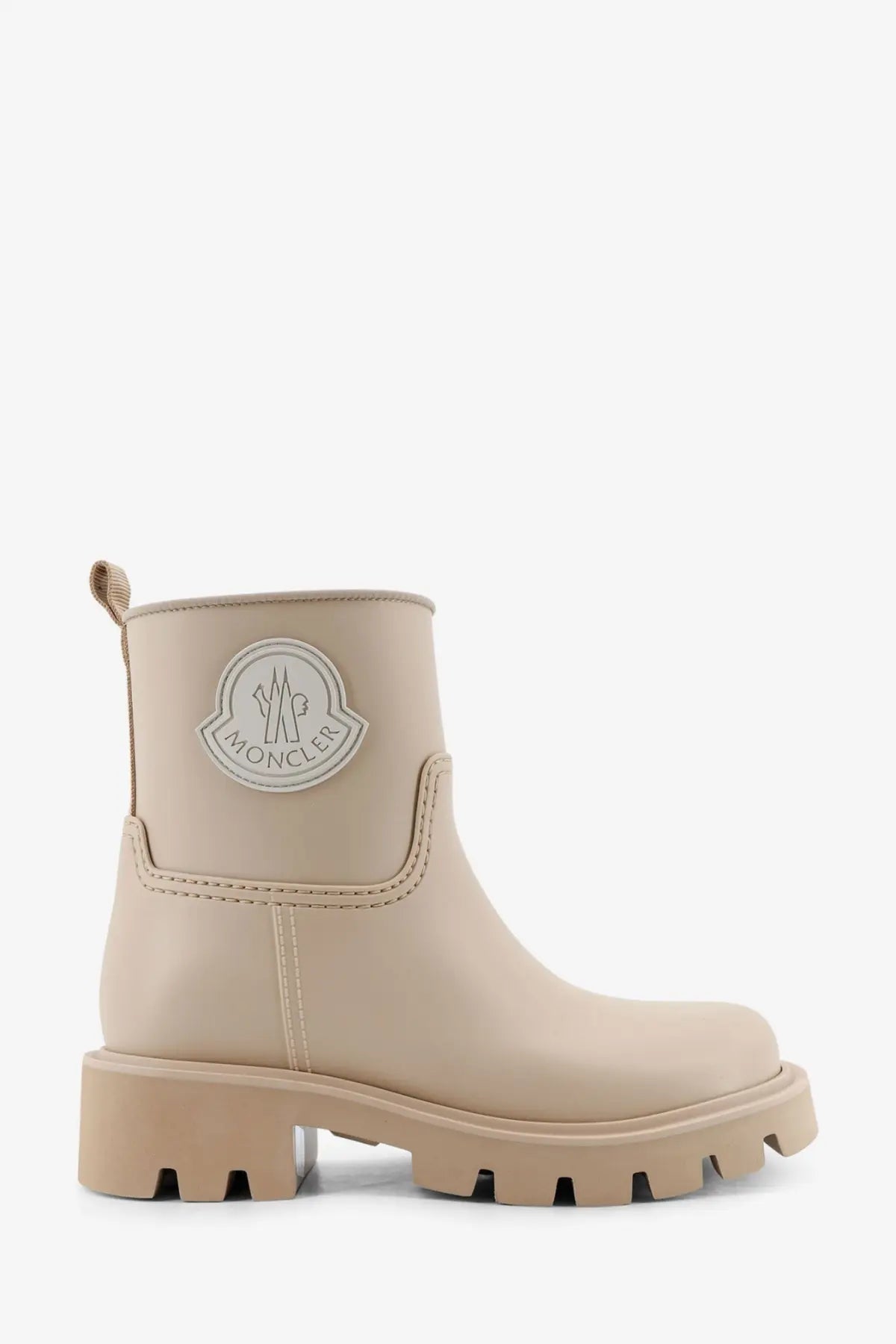 Moncler women’s beige Kickstream rubber rainboots with chunky sole and embossed logo patch on ankle