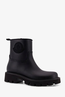 Moncler women’s kickstream black rubber rainboots with chunky sole and embossed logo on the side