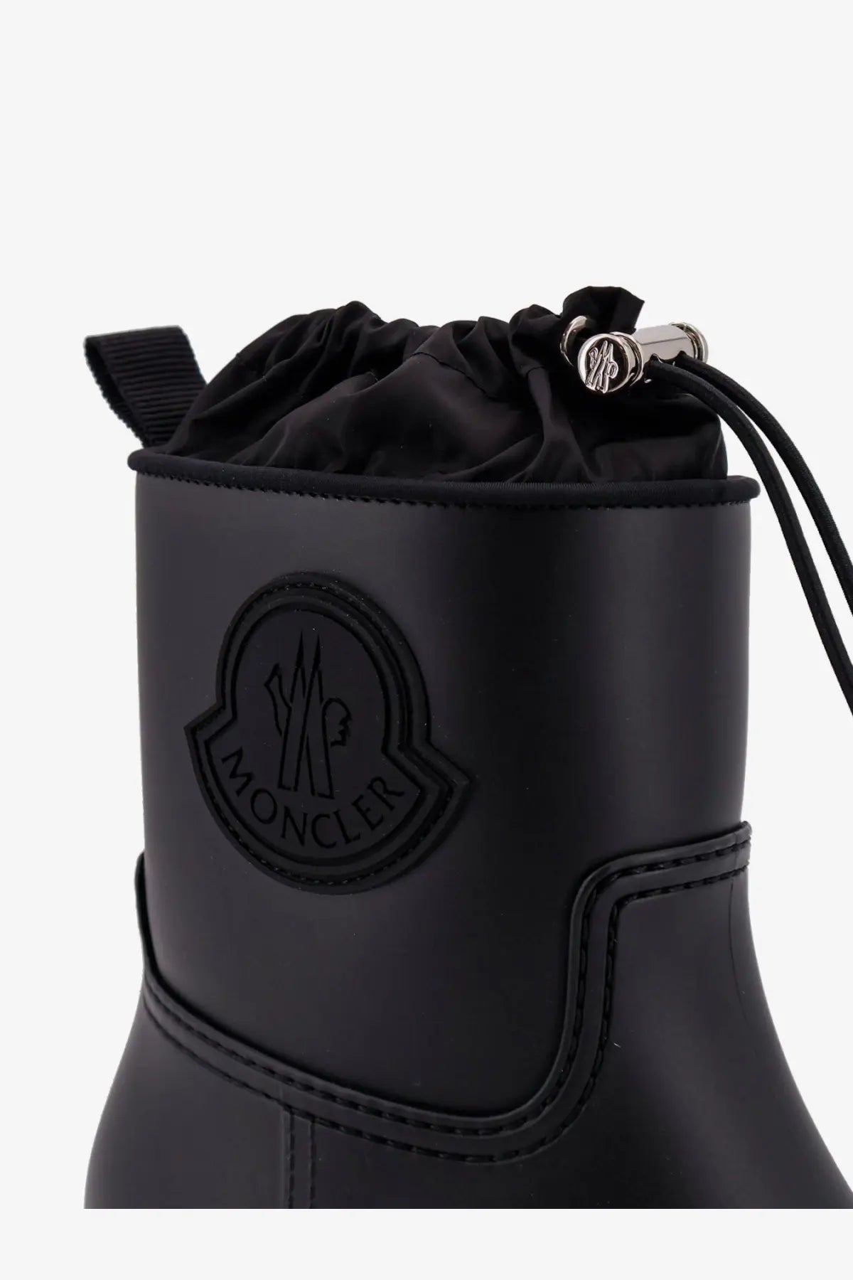 Moncler women’s black Kickstream rubber rainboots with drawstring closure and embossed logo on the side