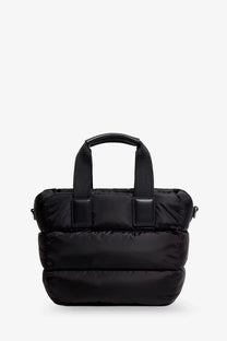 Moncler women’s black nylon Caradoc crossbody bag with puffer quilted sections and sturdy fabric handles