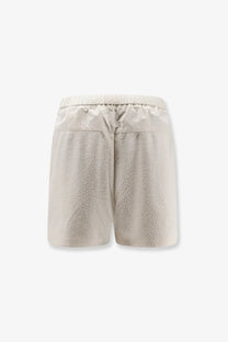 Moncler women’s white nylon shorts with textured shimmering fabric and elastic waistband for comfortable wear