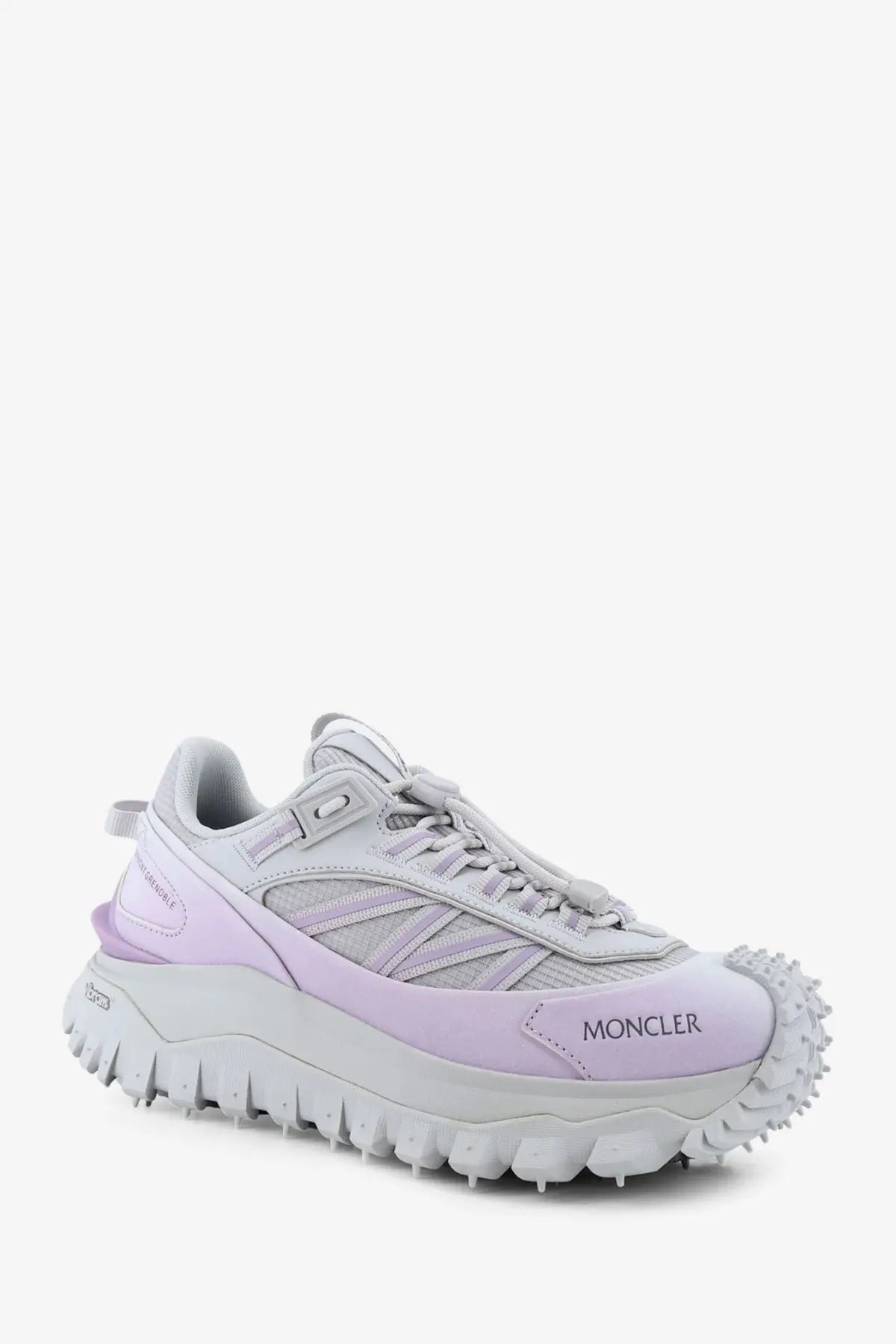 Moncler women’s nylon trailgrip sneaker in light purple and gray with a rugged spiked sole for hiking use
