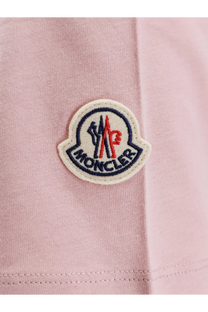 Pink moncler embroidered patch with white border and navy outline on moncler women’s organic cotton shirt pink