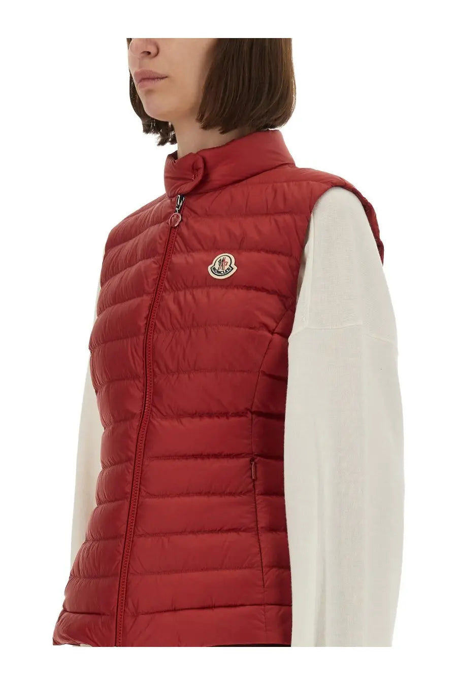 Moncler women’s red padded quilted vest with high collar and zipper closure for lightweight warmth and style