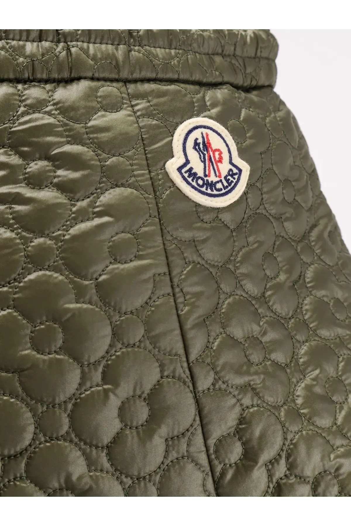Moncler women’s olive green quilted nylon skirt with circular pattern and embroidered logo patch