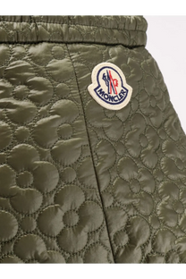 Moncler women’s olive green quilted nylon skirt with circular pattern and embroidered logo patch