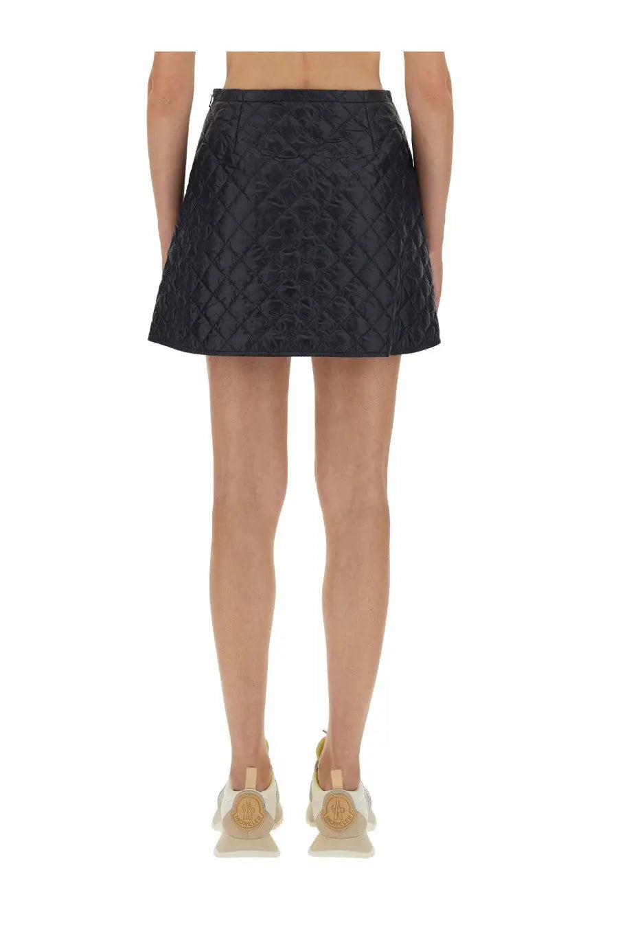 Moncler women’s blue quilted leather mini skirt with structured diamond pattern design