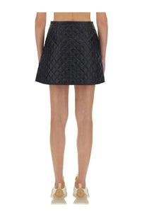 Moncler women’s blue quilted leather mini skirt with structured diamond pattern design