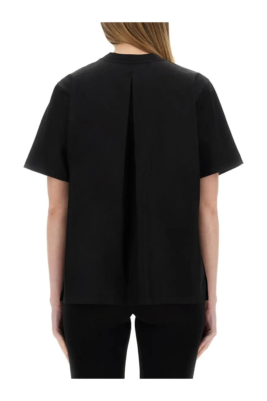 Back view of moncler women’s black short-sleeved shirt with central back pleat and relaxed fit