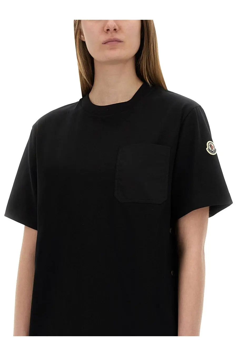 Moncler women’s black short-sleeved t-shirt with chest pocket and logo patch on the sleeve in cotton material