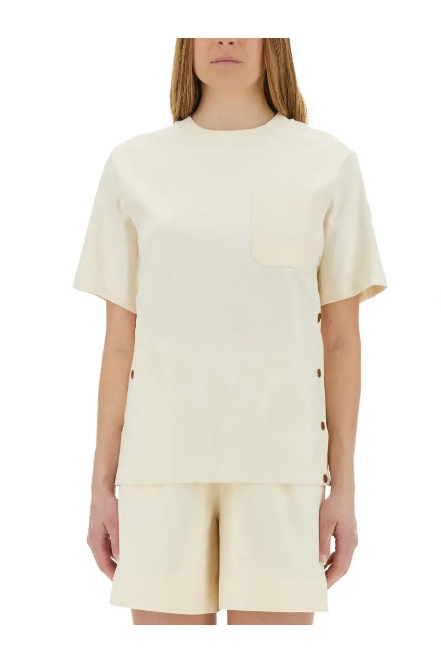 Moncler women’s cream short-sleeved shirt with chest pocket and side seam button details in white cotton blend