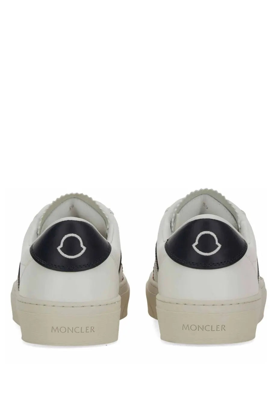 Moncler women’s sneaker white in white leather with black rubber heel tabs and white embroidered logo on the back
