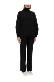Moncler women’s black sweatshirt with high neck long sleeves and ribbed cuffs made from soft fabric