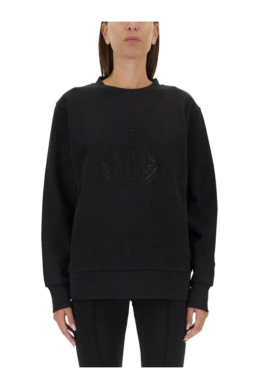 Moncler women’s black sweatshirt with subtle textured logo embroidered in matching black on the chest