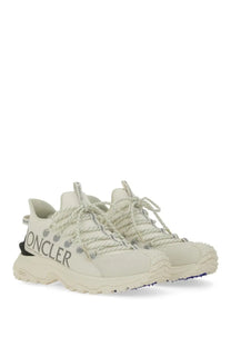 Cream-colored moncler women’s trailgrip lite hiking sneakers with textured laces and rugged chunky sole in beige
