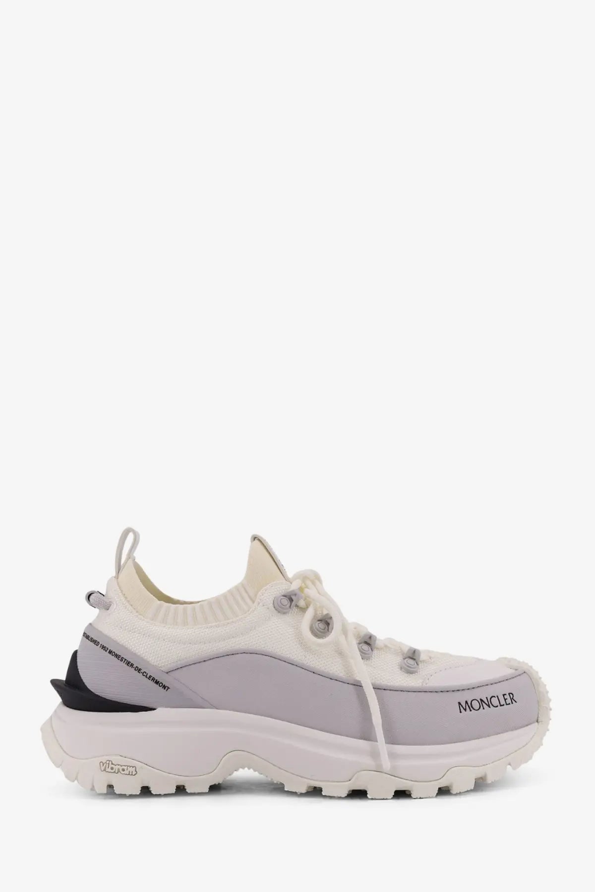 Moncler women’s trailgrip lite3 hiking sneaker in white and gray with textured knit upper rubber outsole and black heel tab
