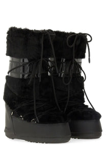 Moon Boot unisex icon boot black with black fur lining glossy strap detailing and chunky platform snow soles