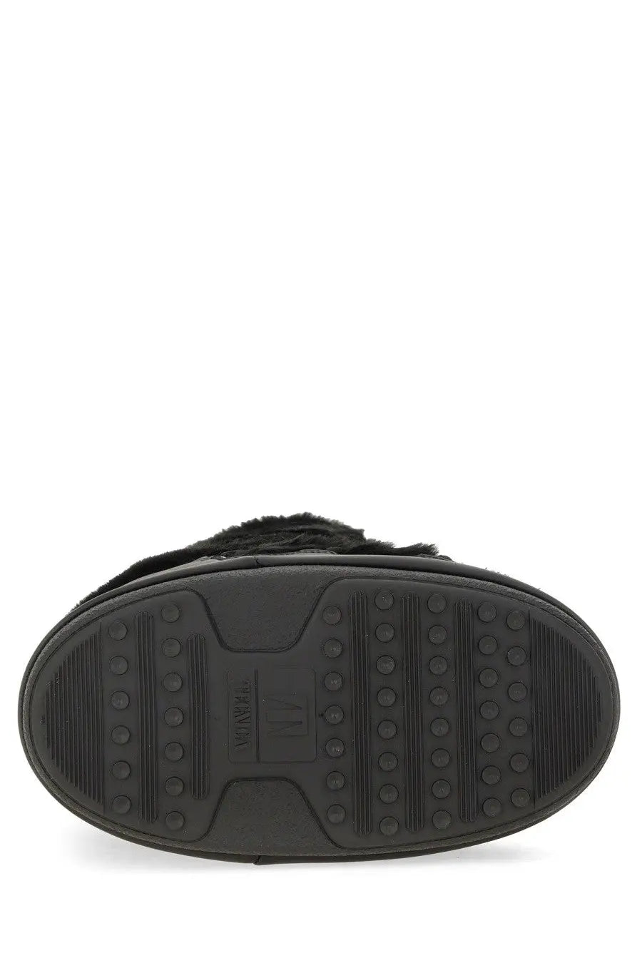 Black rubber sole with textured tread and moon boot branding on the back of moon boot unisex icon boot black