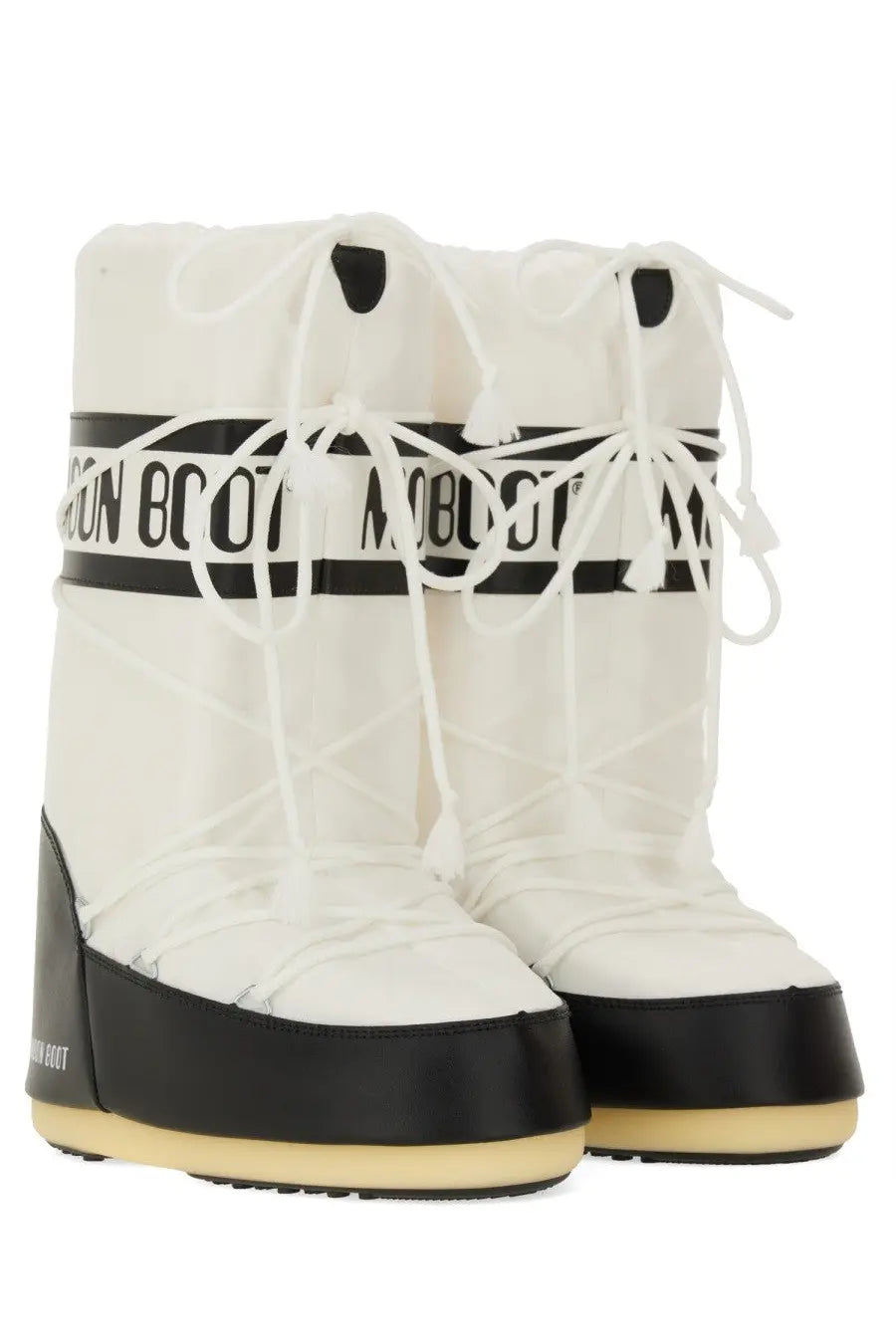 Moon Boot unisex icon boot snow boots in white with black accents featuring a bold moon boot logo band