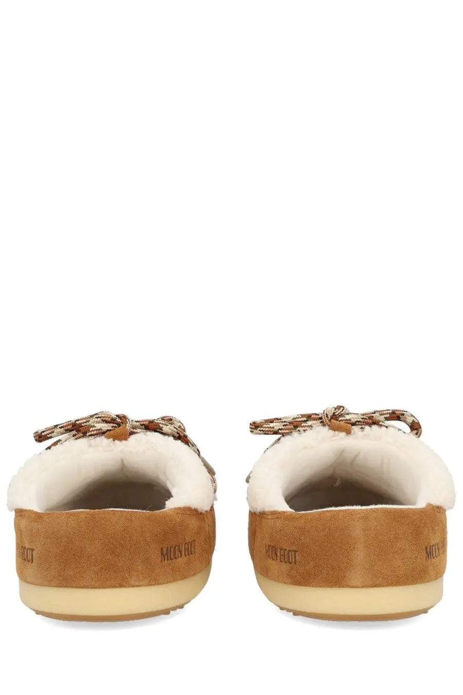Tan suede moon boot unisex shearling evx mules with white shearling lining and patterned braided tie