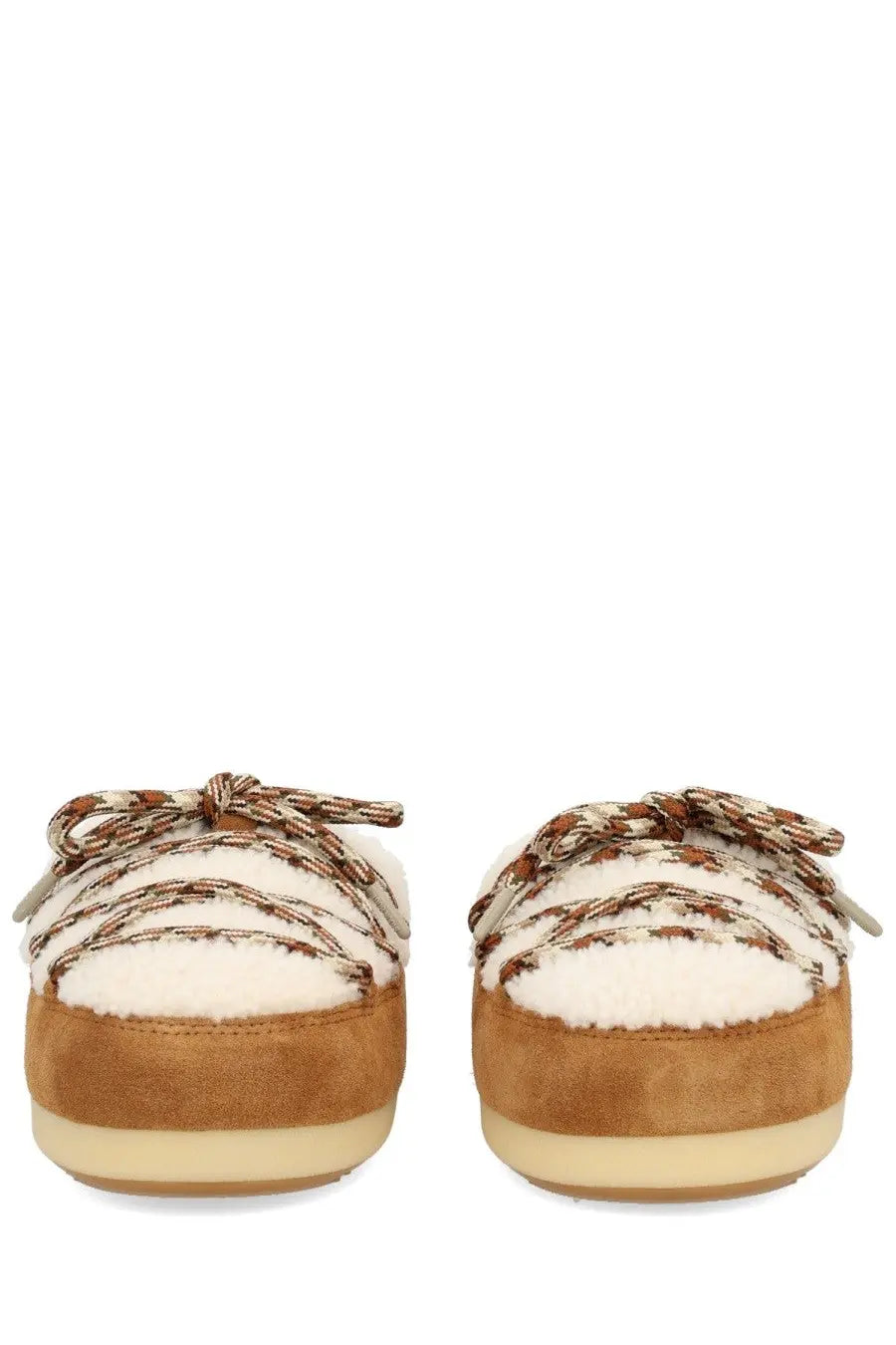 Tan suede slip-on mules with cream shearling lining and patterned laces from moon boot unisex shearling evx mules multicolor