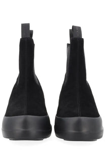 Moon boot women’s chelsea boot moon black shown from back featuring black suede, chunky rubber sole, and pull tabs