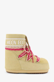 Cream-colored suede moon boot with pink and white woven laces from moon boot women’s icon low suede boots yellow