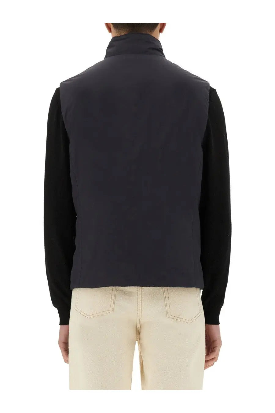 MooRER men’s Senio Skt vest in navy blue quilted fabric worn over black long-sleeved shirt front view