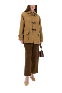 Tan wool duffle coat with black toggle closures and flap pockets styled with Moschino Jeans women’s brown corduroy pants