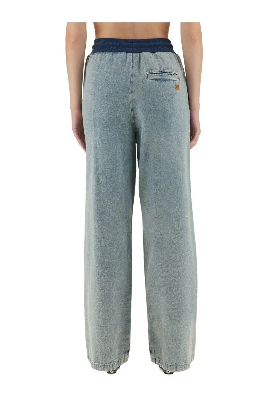 Back of moschino jeans women’s denim blue light-wash wide-leg pants with navy elastic waistband and gold patch