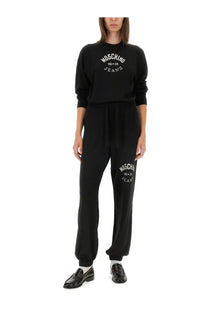 Black Moschino Jeans women’s jogging pants and sweatshirt set with white embroidered logo in cotton blend material
