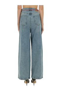 Light-wash denim Moschino wide fit jeans with braided pink belt and classic back pockets shown from the back side