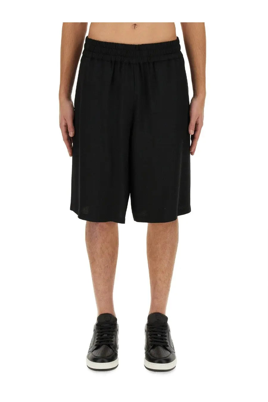 Moschino men’s bermuda black loose-fitting shorts with elastic waistband made from lightweight fabric
