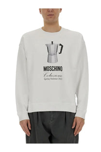 Moschino men’s white sweatshirt featuring a black and silver espresso maker graphic with colazione spring summer 2025 text