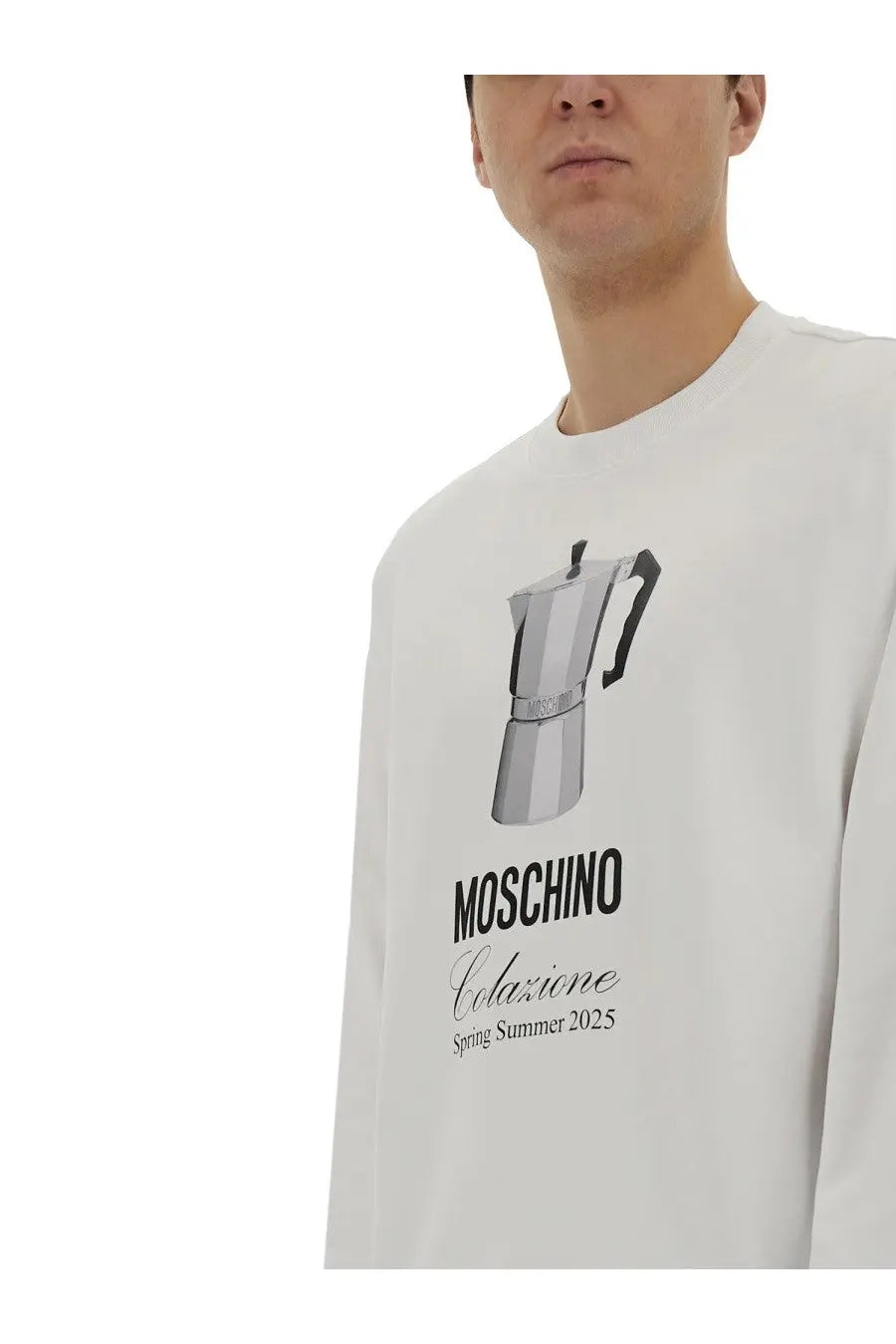 Moschino men’s white long-sleeve sweatshirt with black and silver moka pot graphic and moschino colazione spring summer 2025 print