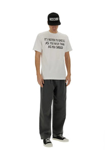 Moschino men’s white cotton t-shirt with black message print it is better to dress as you wish than as you should