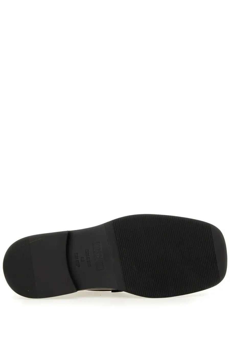 Black rubber sole with textured grip and embossed Moschino logo on the back of men’s Berlin black moccasin