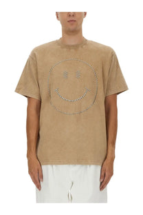 Beige suede textured moschino men’s heavy cotton t shirt with silver stud outline smiling face design brown color