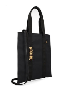 Black Moschino women’s carry me tote bag with gold-tone logo and hardware for stylish everyday use