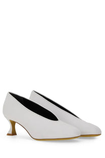 Moschino women’s Decollete Duck white leather pumps with sleek minimalist design and distinctive curved heel front view