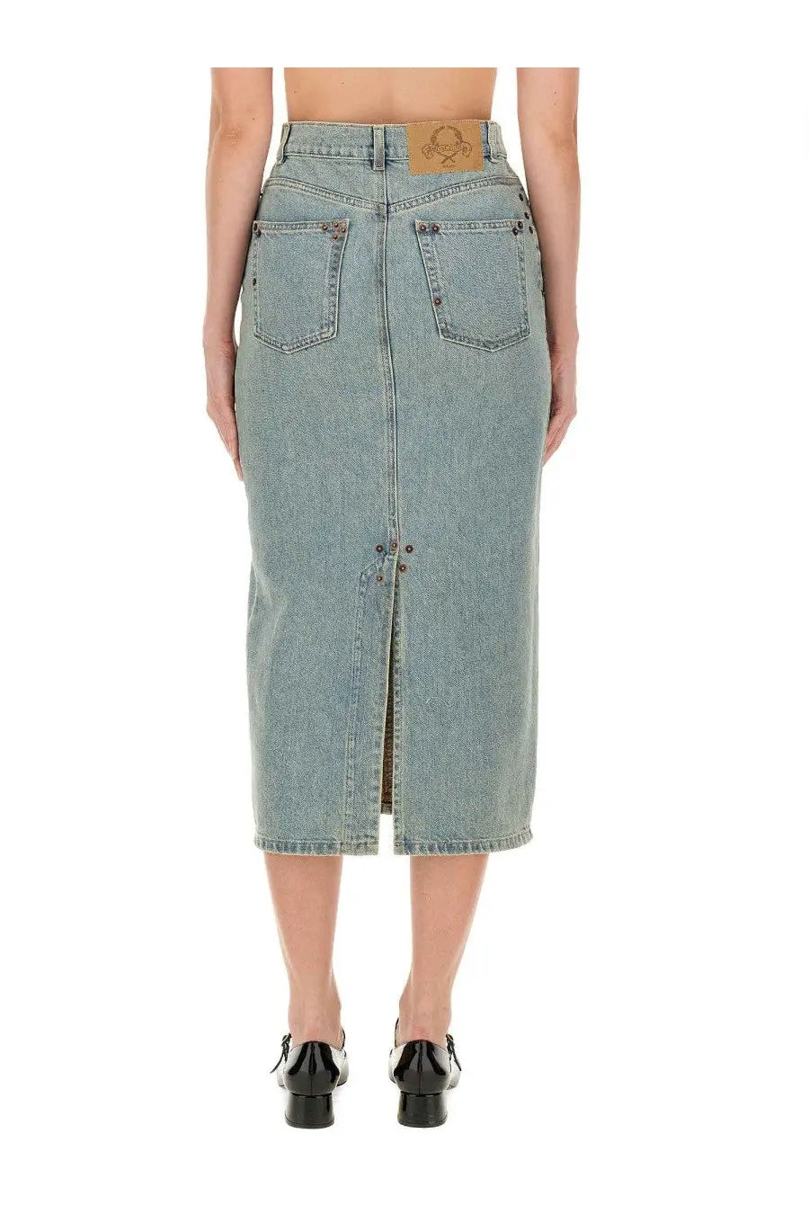 Moschino women’s light-wash denim midi skirt with front zipper and brown leather patch on waistband