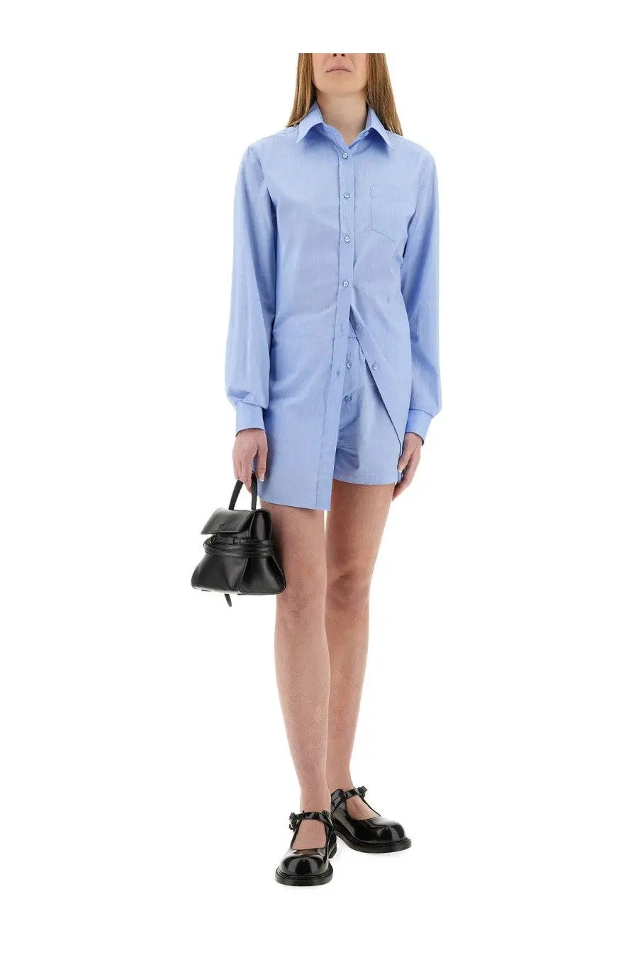 Light blue oversized poplin shirt dress with classic collar and long sleeves by Moschino women’s collection